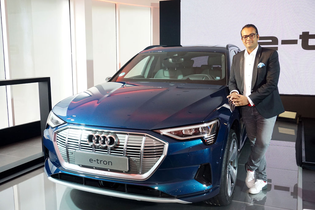 Mr. Rahil Ansari, Head Audi India posing with the Audi e-tron, the India-bound all electric SUV